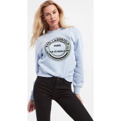 Bluza damska KARL LAGERFELD. Bluzy damskie KARL LAGERFELD, m, bez wzorów, bez ramiączek, bez kaptura. W wyprzedaży za 656.67 zł.