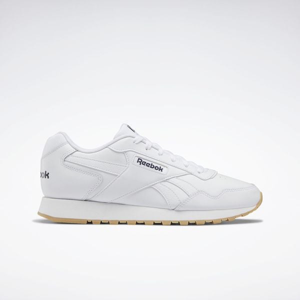 Trampki Męskie Skóra Glide. Białe trampki męskie Reebok, bez wzorów, z gumy, bez zapięcia. Za 189.00 zł.
