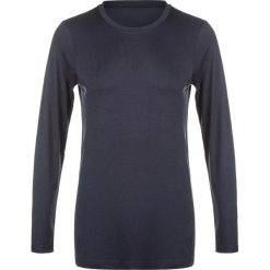 Damska koszulka termoaktywna z długim rękawem Athlecia Julee. Czarne bluzki damskie Athlecia, bez wzorów, sportowe, bez kołnierzyka, bez ramiączek. Za 141.00 zł.