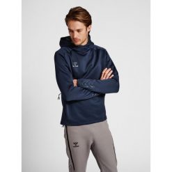 Bluza z kapturem Hummel Cima XK. Niebieskie bluzy męskie Hummel, s, bez wzorów, sportowe, bez ramiączek, z kapturem. W wyprzedaży za 240.25 zł.