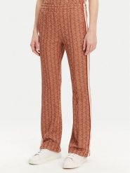 Lacoste Spodnie dresowe XF9313 Pomarańczowy Regular Fit. Brązowe spodnie dresowe damskie Lacoste, bez wzorów, z dresówki. Za 565.90 zł.