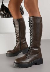 Brązowe Kozaki Grunge VICES w Stylu Workerów Uniama. Brązowe kozaki damskie Born2be, bez wzorów, z dzianiny, bez obcasa, na płaskiej podeszwie, bez zapięcia. Za 169.99 zł.