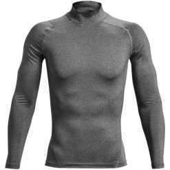 Koszulka z długim rękawem i stójką Under Armour HeatGear®. Czarne bluzy męskie Under Armour, bez wzorów, sportowe, bez ramiączek, bez kaptura. Za 196.00 zł.