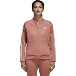 BLUZA ADIDAS DRESOWA SST (42). Żółte bluzy damskie Adidas, bez wzorów, z dresówki, sportowe, bez ramiączek, bez kaptura. W wyprzedaży za 189.99 zł.
