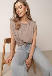 Beżowy Bawełniany Top Oversize Bez Rękawów z Wiązaniem i Poduszkami w Ramionach Apixie. Brązowe topy damskie Born2be, bez wzorów, z bawełny, eleganckie, bez kołnierzyka, bez ramiączek. Za 69.99 zł.