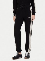 Guess Spodnie dresowe V5BB17 KCX52 Czarny Regular Fit. Czarne spodnie dresowe damskie Guess, z aplikacjami, z dresówki. Za 319.99 zł.