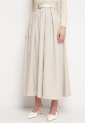 Jasnobeżowa Spódnica o Rozkloszowanym Plisowanym Fasonie z Paskiem z Klamrą Aferna. Brązowe spódnice damskie Born2be, m, bez wzorów, eleganckie, maxi, plisowane. Za 169.99 zł.