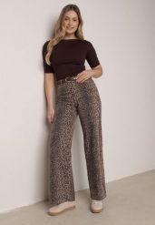 Panterkowe Bawełniane Jeansy z Szerokimi Nogawkami i Wysokim Stanem Salithirae. Jeansy damskie Born2be, bez wzorów, z bawełny, klasyczne, z podwyższonym stanem. Za 129.99 zł.