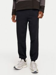 Jack & Jones Spodnie dresowe Morgan 12257964 Czarny Regular Fit. Czarne spodnie sportowe męskie Jack & Jones, m, bez wzorów, z bawełny. Za 119.99 zł.