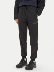 Adidas Spodnie dresowe Z.N.E. JE7842 Czarny Regular Fit. Czarne spodnie dresowe damskie Adidas, bez wzorów, z bawełny. Za 319.99 zł.
