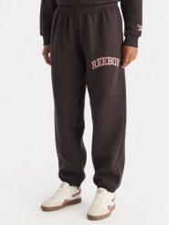 Reebok Spodnie dresowe Marvs RK25165CCW Czarny Regular Fit. Czarne spodnie dresowe damskie Reebok, bez wzorów, z bawełny. Za 199.99 zł.