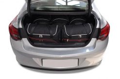 Torby Do Bagażnika Opel Astra Limousine 2012-2019 5Szt Kjust. Czarne torby podróżne damskie KJUST, bez wzorów, z kauczuku. Za 1,586.00 zł.