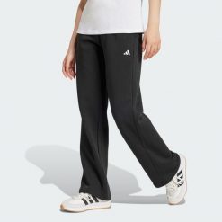 Spodnie Essentials Small Logo Feel Cozy Open-Hem. Czarne spodnie dresowe damskie Adidas, bez wzorów, z polaru, sportowe, długie. Za 157.99 zł.