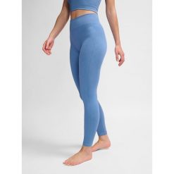 Damskie legginsy bezszwowe Hummel MT Adapt MW. Fioletowe legginsy damskie Hummel, bez wzorów, z materiału. Za 167.00 zł.