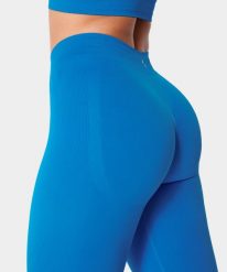 Legginsy bezszwowe z push-up dla kobiet na siłownię Carpatree Eris. Niebieskie legginsy damskie Carpatree, bez wzorów, z dzianiny. Za 175.99 zł.