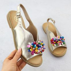 Sandały damskie z koralikami złote Filippo DS6230. Żółte sandały damskie Filippo, bez wzorów, ze skóry ekologicznej, bez obcasa, bez zapięcia. Za 129.99 zł.