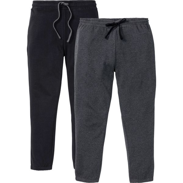 Spodnie dresowe (2 pary). Czarne spodnie sportowe męskie bonprix, m, bez wzorów, z dresówki. Za 219.99 zł.