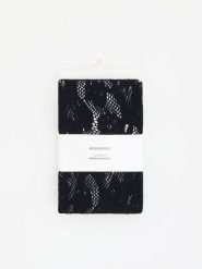 Wzorzyste legginsy - czarny. Czarne legginsy damskie Reserved, bez wzorów, z dzianiny. Za 69.99 zł.