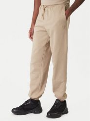 Guess Spodnie dresowe Z6RB03 K9YI1 Beżowy Regular Fit. Brązowe spodnie sportowe męskie Guess, m, z aplikacjami, z bawełny. Za 349.99 zł.