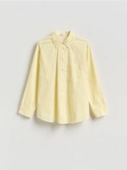 Bawełniana koszula w paski - jasnożółty. Żółte koszule damskie Reserved, l, bez wzorów, z bawełny, bez kołnierzyka, bez ramiączek. Za 109.99 zł.