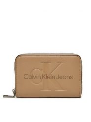 Calvin Klein Jeans Portfel Zip Around Mono K60K612255 Beżowy. Brązowe portfele damskie Calvin Klein Jeans, z jeansu. Za 139.99 zł.