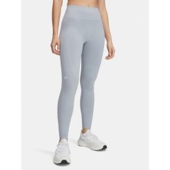 Legginsy Damskie Under Armour Sportowe Treningowe. Niebieskie legginsy damskie Under Armour, bez wzorów, bez zapięcia, na fitness i siłownię. Za 299.99 zł.