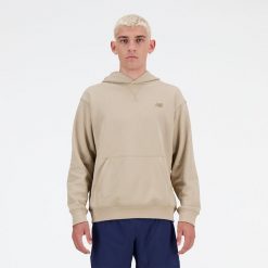 Bluza męska New Balance MT41534SOT – beżowa. Brązowe bluzy męskie New Balance, m, bez wzorów, z materiału, z kapturem. Za 199.99 zł.