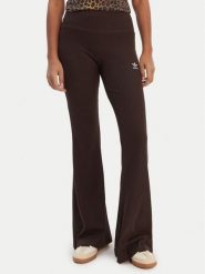 Adidas Legginsy Essentials KD3849 Brązowy Flared Leg. Brązowe legginsy damskie Adidas, bez wzorów, z wiskozy. Za 219.99 zł.