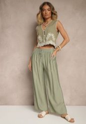 Jasnozielone Spodnie z Wiskozy High Waist o Szerokim Kroju Divlise. Zielone spodnie materiałowe damskie Renee, bez wzorów, z jeansu, eleganckie, z podwyższonym stanem. Za 39.99 zł.