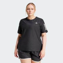 Koszulka Own The Run (Plus Size). Czarne bluzki damskie Adidas, m, bez wzorów, z materiału, sportowe, bez kołnierzyka, plus size, bez ramiączek. W wyprzedaży za 104.30 zł.