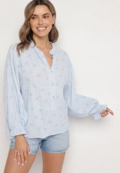Jasnoniebieska Bluzka z Bawełny z Falbankami w Kokardki Reivania. Niebieskie bluzki damskie Born2be, uniwersalny, bez wzorów, z bawełny, klasyczne, bez kołnierzyka, bez ramiączek. Za 109.99 zł.