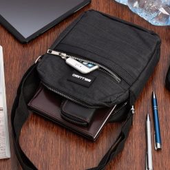 Torba na ramię męska saszetka listonoszka raportówka czarna lekka pojemna GR-7405. Czarne saszetki i nerki męskie na ramię. Za 54.99 zł.