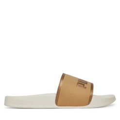 Klapki Puma. Brązowe klapki damskie Puma, bez wzorów, bez obcasa, bez zapięcia. Za 79.99 zł.