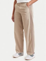 Adidas Spodnie materiałowe 3 Stripes Pleated Trousers KE4175 Beżowy Regular Fit. Brązowe spodnie materiałowe męskie Adidas, bez wzorów, z materiału. Za 298.99 zł.