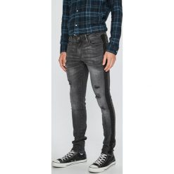 Jack & Jones - Jeansy Liam. Szare jeansy męskie Jack & Jones, z bawełny. W wyprzedaży za 129.90 zł.