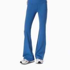 Legginsy treningowe damskie Cardio Bunny Flare. Niebieskie legginsy damskie Cardio Bunny, bez wzorów, z elastanu. Za 159.99 zł.