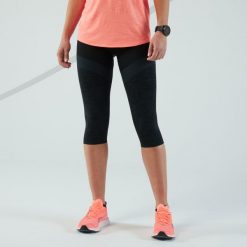 Legginsy do biegania krótkie damskie Kiprun Care. Czarne legginsy damskie KIPRUN, bez wzorów, z elastanu. Za 99.99 zł.