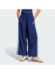Adidas Spodnie dresowe Essentials 3-Stripes JV5328 Granatowy Loose Fit. Niebieskie spodnie dresowe damskie Adidas, bez wzorów, z dresówki. Za 218.99 zł.