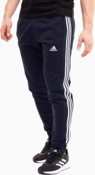 Adidas Spodnie męskie adidas Essentials French Terry Tapered Cuff 3-Stripes granatowe IC9406 S. Spodnie sportowe męskie Adidas, m, bez wzorów. Za 182.12 zł.