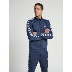 Kurtka Hummel Nathan 2.0 zip. Niebieskie kurtki męskie Hummel, s, bez wzorów, z poliesteru, sportowe, bez kaptura. Za 285.40 zł.