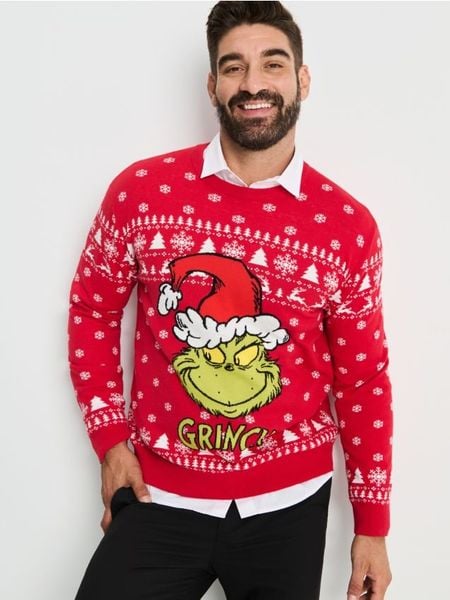 Sweter ze świątecznym motywem Grinch - czerwony. Czerwone swetry męskie Sinsay, l, bez wzorów, wizytowe, bez kołnierzyka, bez ramiączek. Za 79.99 zł.