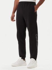 Calvin Klein Spodnie dresowe Eu Sportswear Graphic LV04LF236G Czarny Regular Fit. Czarne spodnie sportowe męskie Calvin Klein, m, bez wzorów, z bawełny. Za 369.99 zł.
