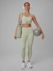 4F Legginsy treningowe bezszwowe damskie - zielone XS/S. Zielone legginsy damskie 4F, bez wzorów, ze skóry. Za 149.99 zł.