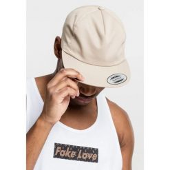 Czapka Flexfit untructured 5-panel. Zielone czapki damskie FLEXFIT, bez wzorów. Za 68.15 zł.