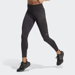 Legginsy DailyRun 7/8. Czarne legginsy damskie Adidas, bez wzorów. W wyprzedaży za 239.20 zł.