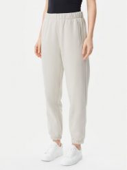 Gap Spodnie dresowe 765568-03 Beżowy Relaxed Fit. Brązowe spodnie dresowe damskie GAP, bez wzorów, z bawełny. Za 149.99 zł.