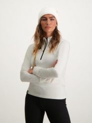 Bluza narciarska damska Poederbaas. Białe bluzy damskie POEDERBAAS, na zimę, l, bez wzorów, z materiału, bez ramiączek, bez kaptura. Za 164.70 zł.