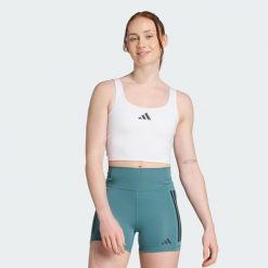 Koszulka Power Light Support Bra. Białe bluzki damskie Adidas, xs, bez wzorów, sportowe, bez kołnierzyka, bez ramiączek. Za 199.00 zł.