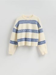 Sweter we wzory - niebieski. Niebieskie swetry nierozpinane damskie Reserved, l, bez wzorów, z dzianiny, bez kołnierzyka, bez ramiączek. Za 129.99 zł.