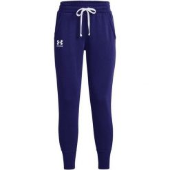Spodnie Do Biegania Rival Fleece Dla Kobiet. Niebieskie spodnie dresowe damskie Under Armour, bez wzorów, sportowe, długie. Za 302.99 zł.